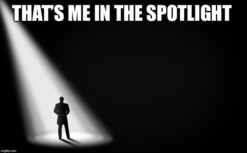 Person in spotlight