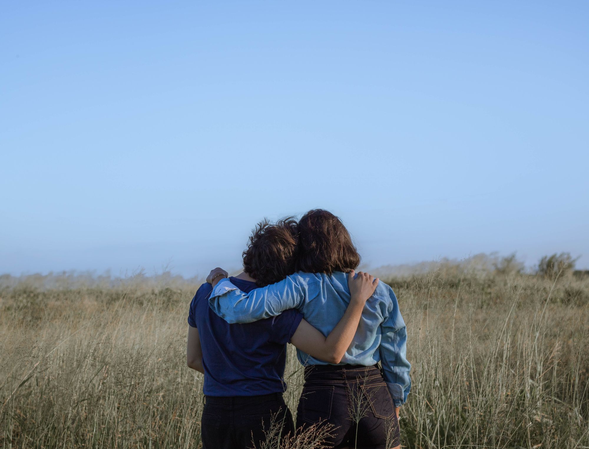 two friends embracing